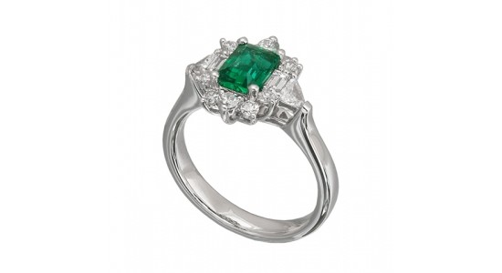 a white gold fashion ring featuring an emerald cut emerald and diamond accents