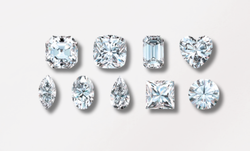 A view of multiple lab-grown diamonds in a variety of different shapes.