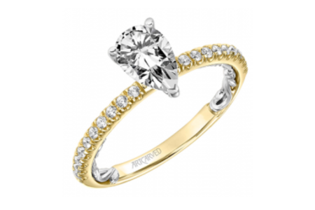 A simple yet elegant Artcarved engagement ring with a pear center stone, available at Rogers Jewelry Co.