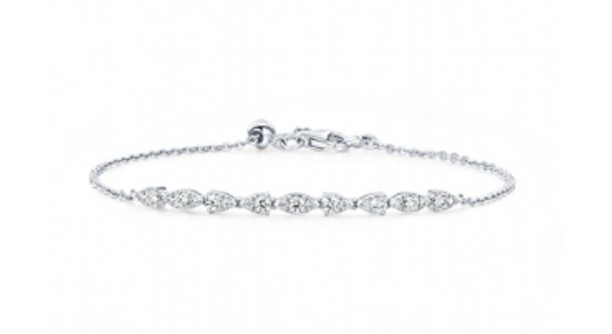 a delicate diamond bracelet featuring a fine chain