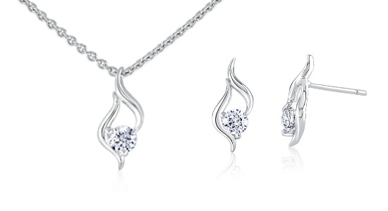 a set of diamond jewelry featuring flame-like motifs