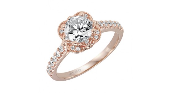 a rose gold engagement ring with a round cut center stone and side stones