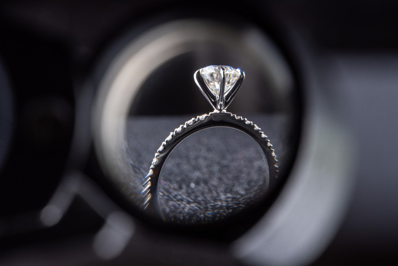 A view of a diamond ring through a jeweler’s microscope.