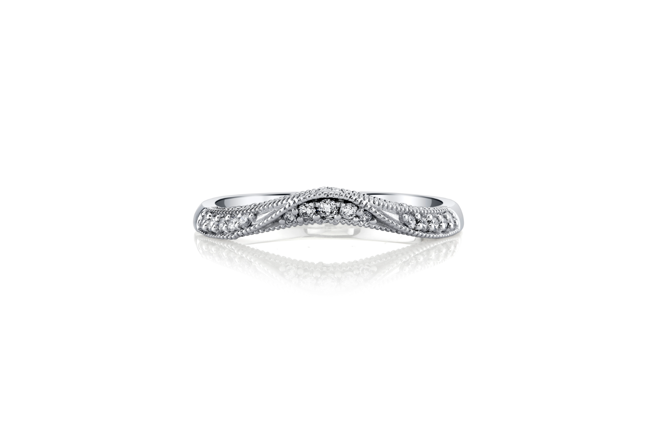A nature-inspired wedding band with diamond details.