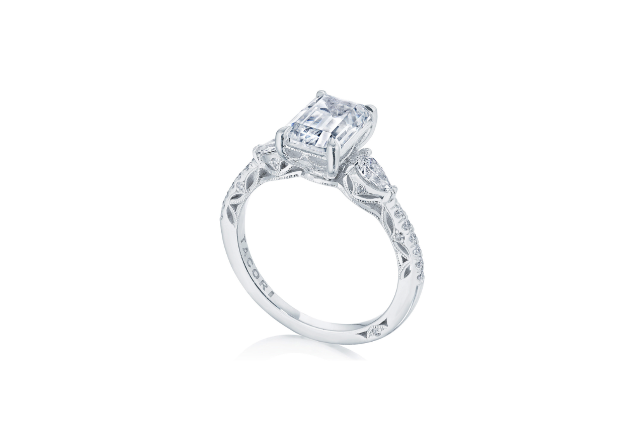 A TACORI engagement ring with a botanical feel and an emerald cut diamond.