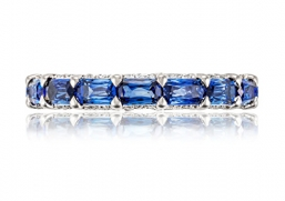 A TACORI Classic Crescent wedding band adorned with sapphires, available at Rogers Jewelry Co. A TACORI Classic Crescent wedding band adorned with sapphires, available at Rogers Jewelry Co.