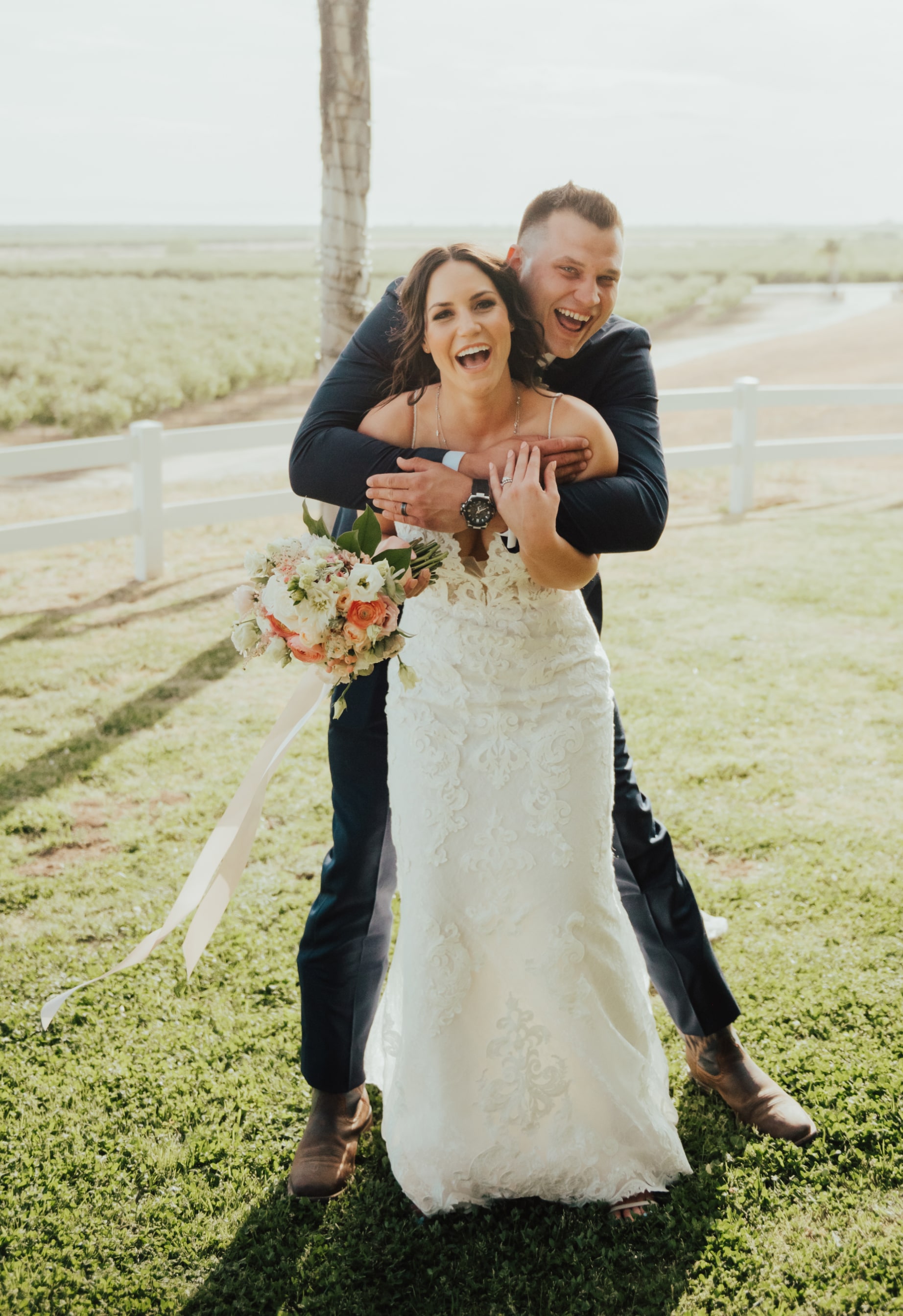 Karlie Tanner & Spouse Karlie and her husband hugging her from behind
