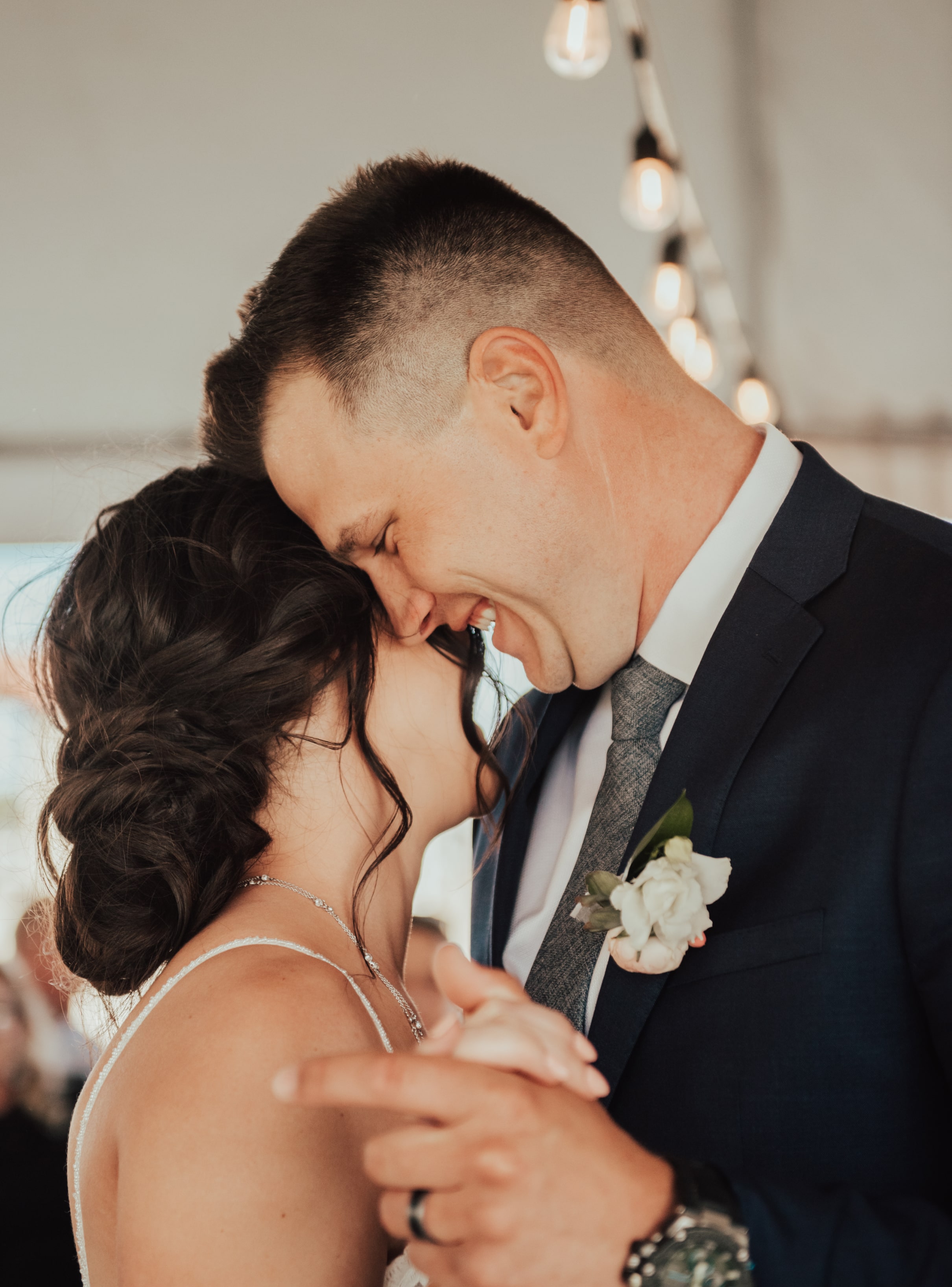 Karlie Tanner & Spouse Karlie spends a tender moment with her husband as they hug